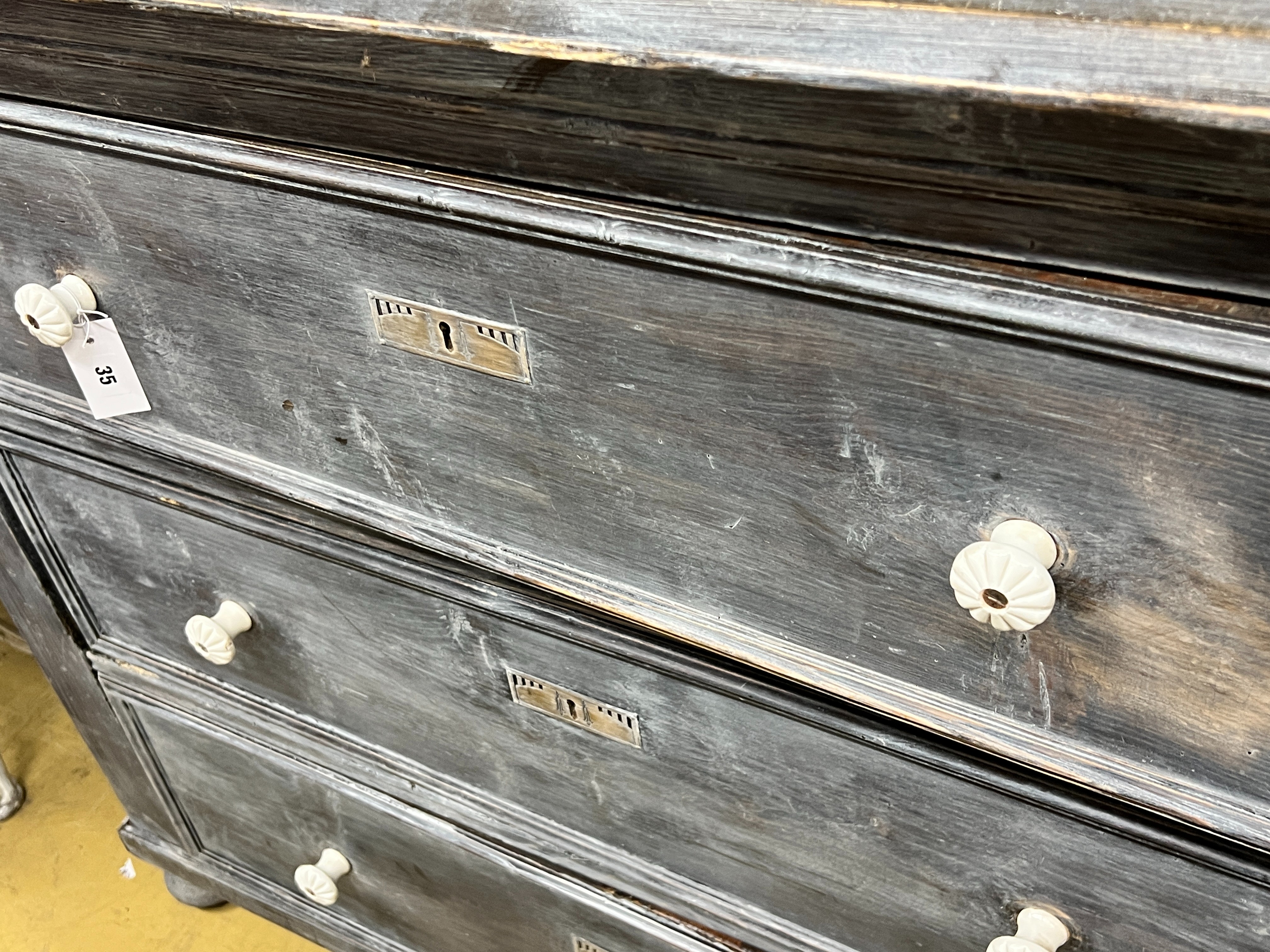 A 19th century East European painted pine three drawer chest, width 133cm, depth 62cm height 106cm